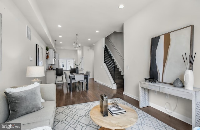 1620 N 5th Ct, Philadelphia, PA 19122 - living room featuring stairway, recessed lighting, wood finished floors, and a chandelier