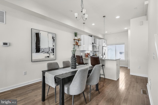 1620 N 5th Ct, Philadelphia, PA 19122 - dining area featuring dark wood-style floors, recessed lighting, and a chandelier