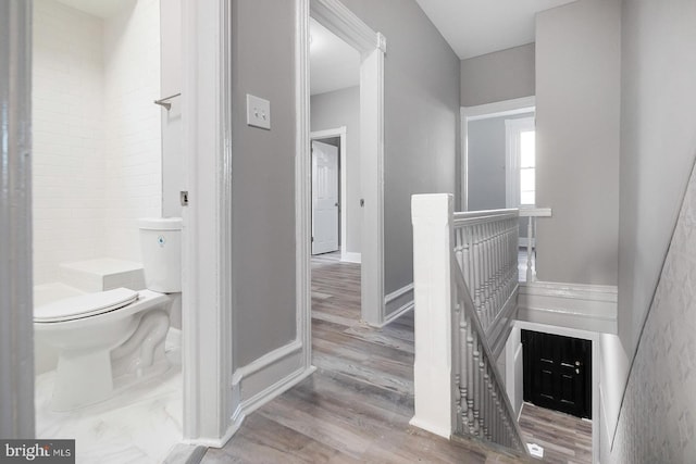 2332 N 25th St, Philadelphia, PA 19132 - hall featuring an upstairs landing and wood finished floors