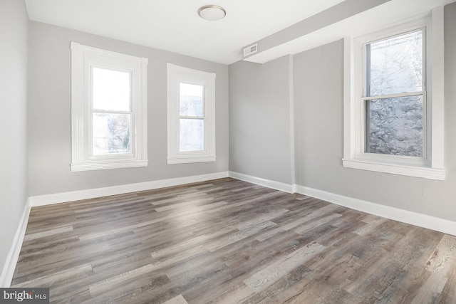 2332 N 25th St, Philadelphia, PA 19132 - empty room with baseboards and wood finished floors