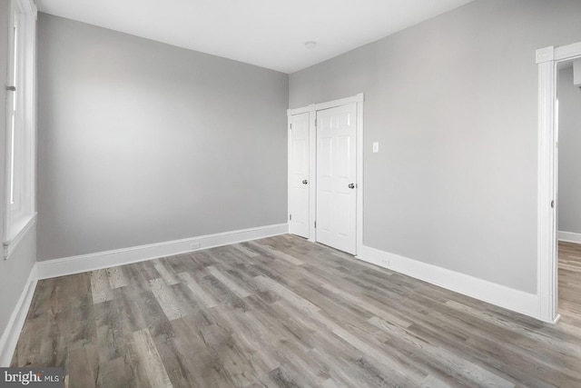 2332 N 25th St, Philadelphia, PA 19132 - spare room with wood finished floors and baseboards