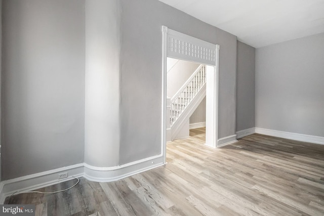 2332 N 25th St, Philadelphia, PA 19132 - unfurnished room featuring wood finished floors and stairway