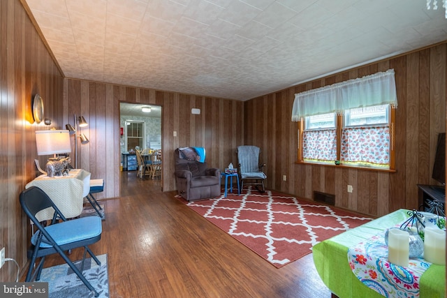 519 Jefferson St, East Greenville, PA 18041 - living room featuring wood finished floors and wood walls