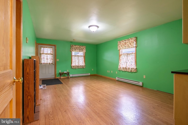 519 Jefferson St, East Greenville, PA 18041 - spare room featuring a baseboard radiator and wood finished floors