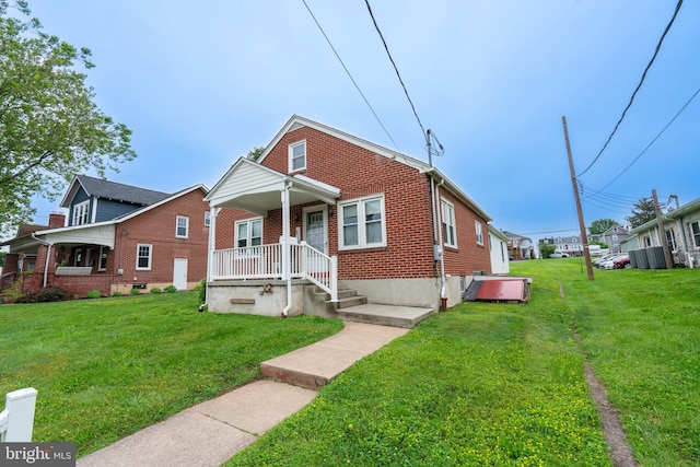 519 Jefferson St, East Greenville, PA 18041 - bungalow-style house featuring brick siding and a front yard
