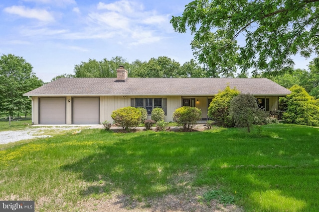 724 Franklinville Rd, Mullica Hill, NJ 08062 - ranch-style house featuring a chimney, an attached garage, driveway, and a front yard