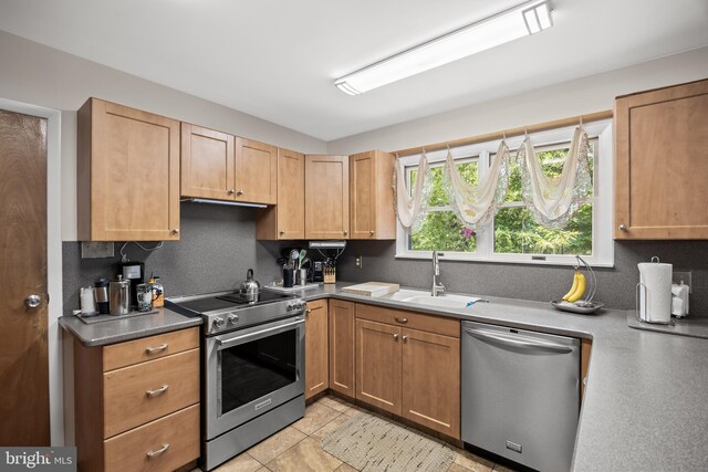 724 Franklinville Rd, Mullica Hill, NJ 08062 - kitchen featuring appliances with stainless steel finishes and tasteful backsplash