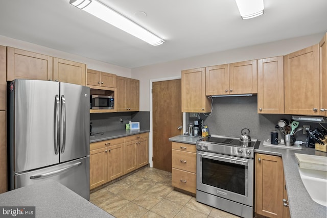 724 Franklinville Rd, Mullica Hill, NJ 08062 - kitchen with stainless steel appliances and light brown cabinets