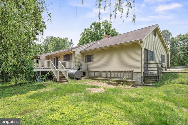 724 Franklinville Rd, Mullica Hill, NJ 08062 - back of property featuring a chimney, heating fuel, a deck, a shingled roof, and stairs