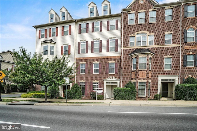 202 Mill Pond Rd, Frederick, MD 21701 - townhome / multi-family property with brick siding
