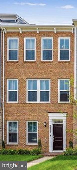 17153 Cumberland Height Dr, Dumfries, VA 22026 - multi unit property featuring brick siding and a front lawn