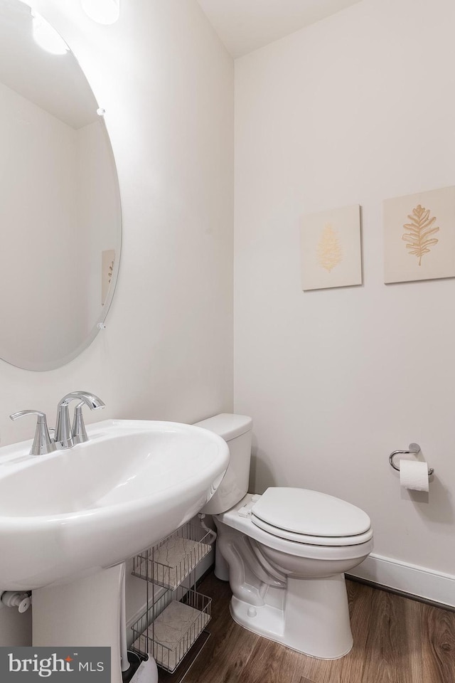 17153 Cumberland Height Dr, Dumfries, VA 22026 - half bath featuring wood finished floors