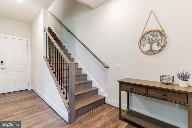 17153 Cumberland Height Dr, Dumfries, VA 22026 - stairs with wood finished floors and baseboards