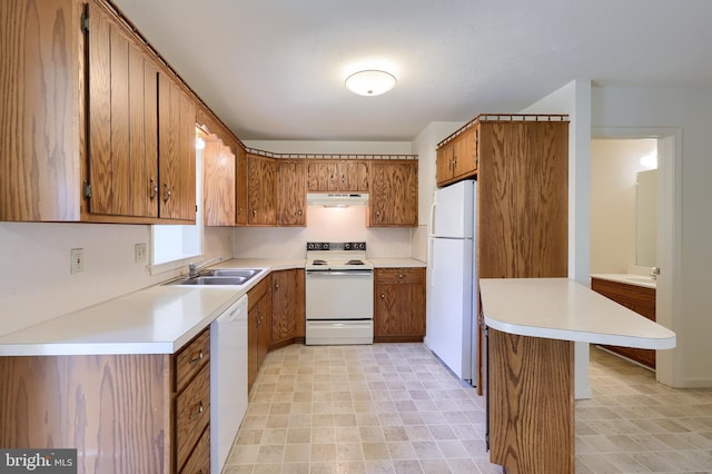 15 Jason Ave, Denver, PA 17517 - kitchen featuring white appliances, brown cabinetry, light countertops, and light floors
