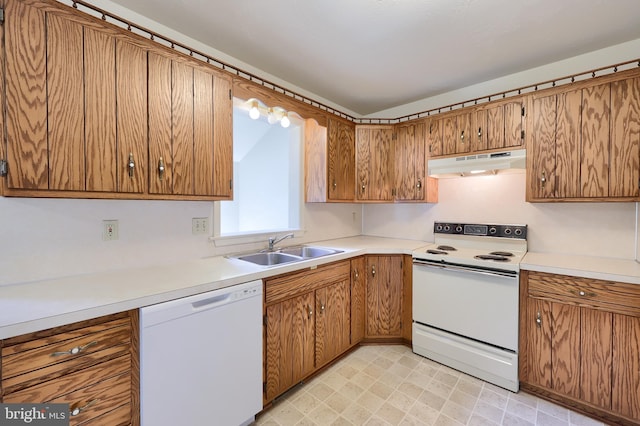 15 Jason Ave, Denver, PA 17517 - kitchen with white appliances, under cabinet range hood, and brown cabinetry