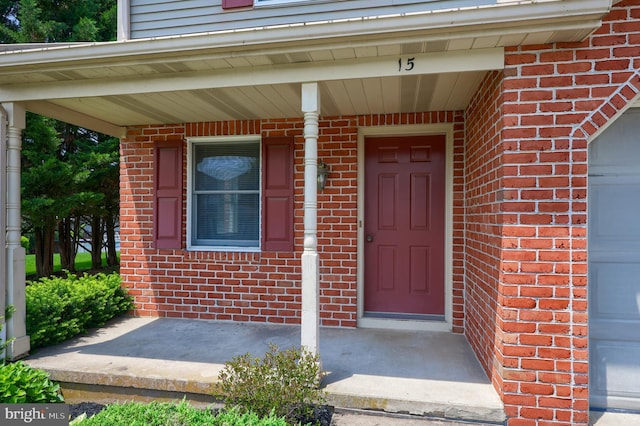 15 Jason Ave, Denver, PA 17517 - doorway to property with brick siding and covered porch