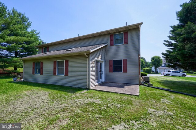 15 Jason Ave, Denver, PA 17517 - rear view of house featuring a patio and a lawn