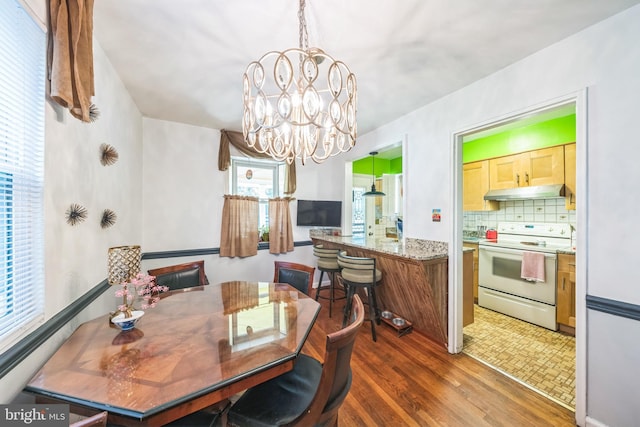 712 Chesapeake St SE, Washington, DC 20032 - dining room with a chandelier and wood finished floors