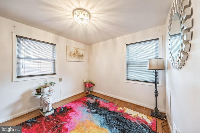 712 Chesapeake St SE, Washington, DC 20032 - sitting room with a chandelier, wood finished floors, and healthy amount of natural light