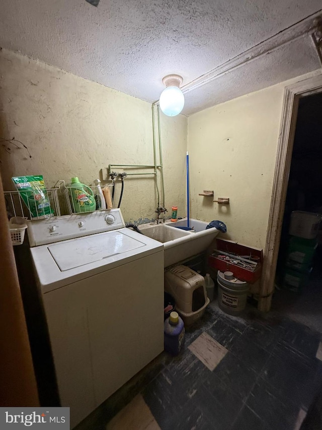 7221 Charles St, Philadelphia, PA 19135 - washroom with washer / clothes dryer, a textured ceiling, and a textured wall
