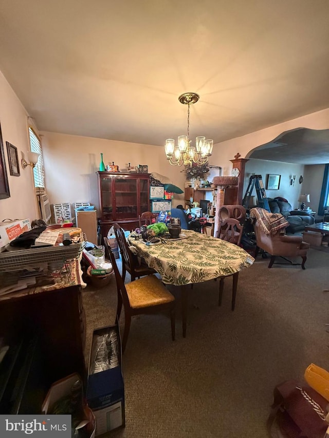 7221 Charles St, Philadelphia, PA 19135 - dining area featuring carpet floors and a chandelier