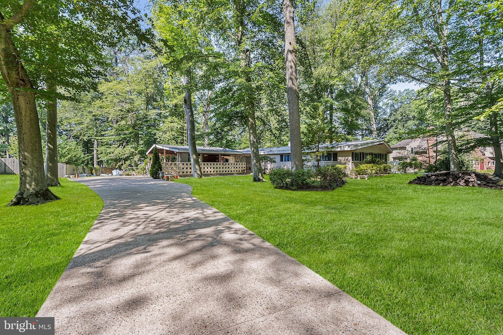 25 Oriole Way, Moorestown, NJ 08057 - view of front facade featuring a front lawn and asphalt driveway