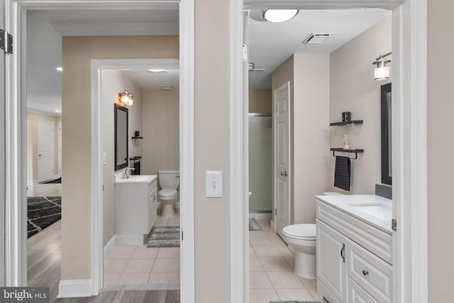 708 Zlotkin Cir, Freehold, NJ 07728 - bathroom featuring vanity, tile patterned floors, and a shower