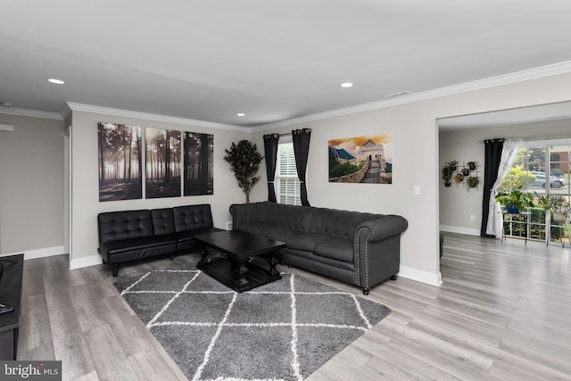 708 Zlotkin Cir, Freehold, NJ 07728 - living room with plenty of natural light, wood finished floors, ornamental molding, and recessed lighting