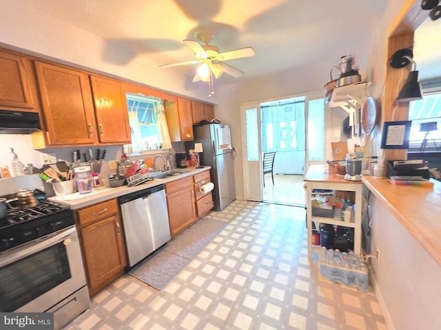 53 Valley Rd, Mount Ephraim, NJ 08059 - kitchen featuring appliances with stainless steel finishes, light flooring, light countertops, and plenty of natural light