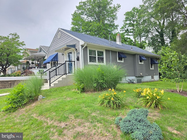 53 Valley Rd, Mount Ephraim, NJ 08059 - view of front facade with a front lawn and a chimney