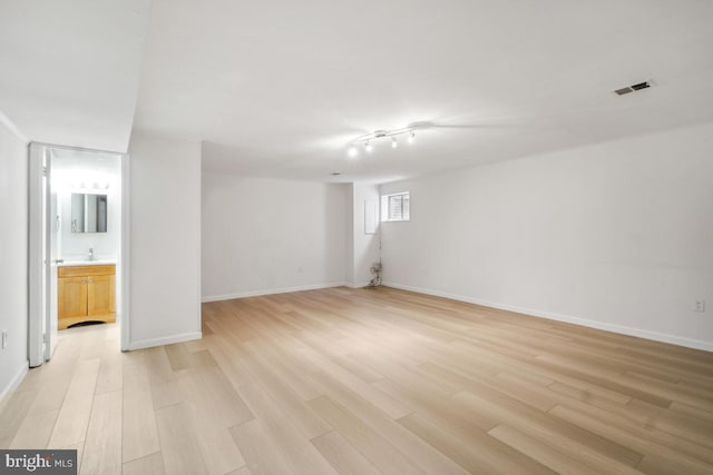 70 Oak Shade Rd, Gaithersburg, MD 20878 - basement with light wood-type flooring and baseboards