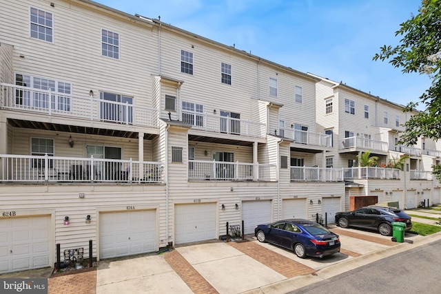 622 Main St Unit 622B, Gaithersburg, MD 20878 - view of property featuring driveway and a garage