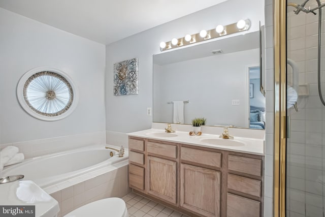 3818 White Post Ct, Alexandria, VA 22304 - bathroom featuring a bath, tile patterned flooring, double vanity, ensuite bathroom, and a tile shower