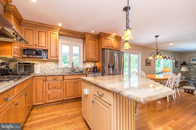 760 Audubon Dr, North Wales, PA 19454 - kitchen featuring wall chimney range hood, stainless steel appliances, light wood-style floors, plenty of natural light, and recessed lighting