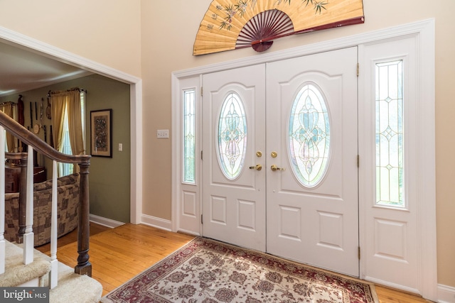 760 Audubon Dr, North Wales, PA 19454 - foyer featuring light wood-style flooring, stairs, and healthy amount of natural light