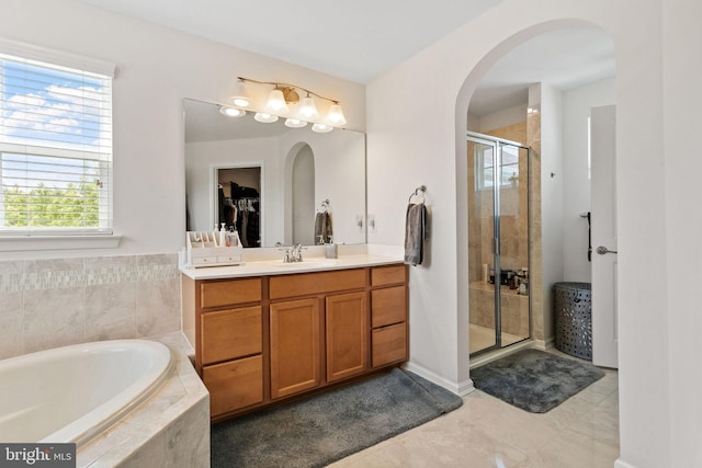 29 Carrington Way, Marlton, NJ 08053 - bathroom with a shower stall, vanity, a garden tub, tile patterned flooring, and a walk in closet