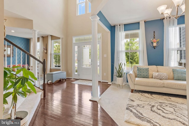 29 Carrington Way, Marlton, NJ 08053 - entrance foyer with ornate columns, a chandelier, dark wood finished floors, and stairway
