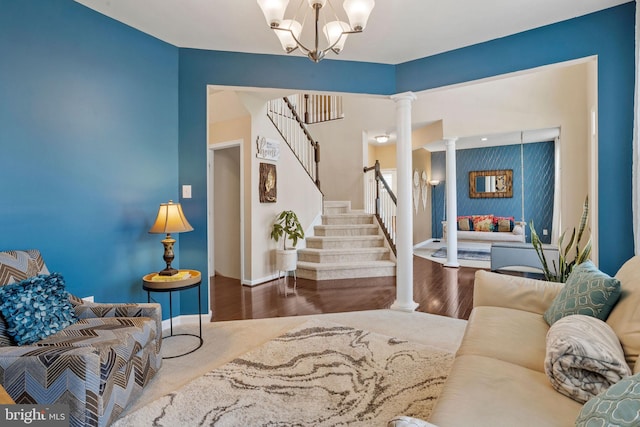 29 Carrington Way, Marlton, NJ 08053 - living room with ornate columns, stairs, a chandelier, and wood finished floors