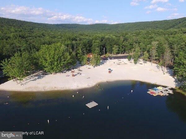 532 Buck Mountain Blvd, Hazle Township, PA 18202 - drone / aerial view of a heavily wooded area and a large body of water