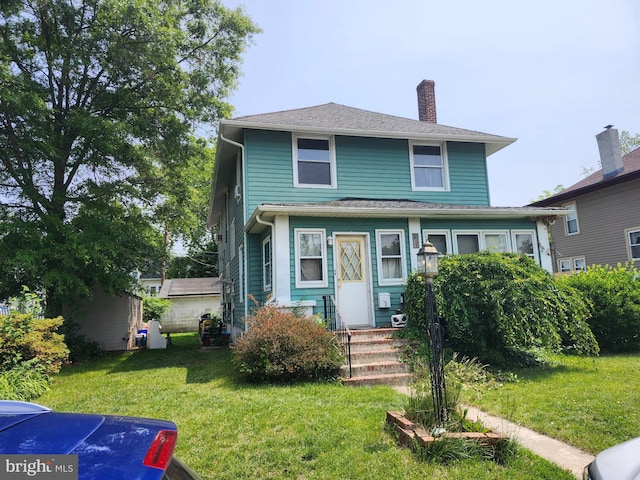 15 Spring St, Penns Grove, NJ 08069 - american foursquare style home featuring a chimney and a front yard