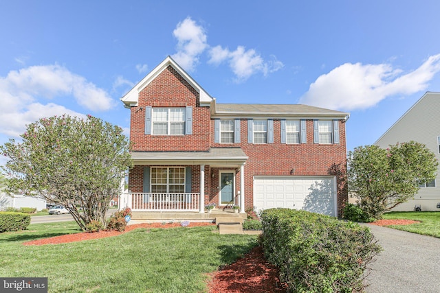 1 Fletcher Dr, Fredericksburg, VA 22406 - traditional-style home featuring a porch, brick siding, a garage, driveway, and a front lawn