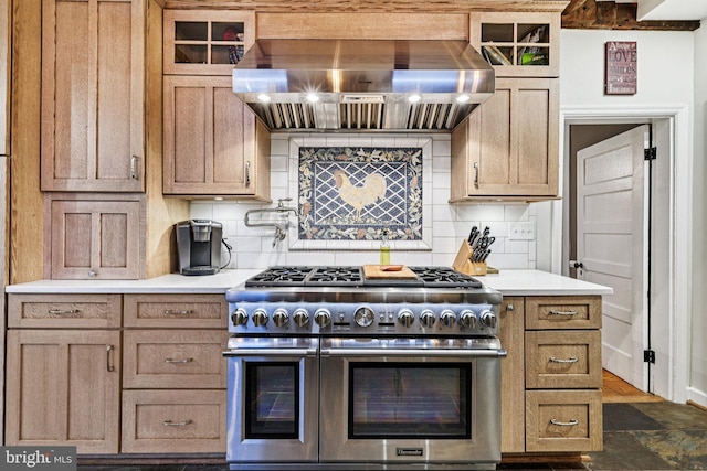 12353 Barbee Rd, Bristow, VA 20136 - kitchen featuring double oven range, extractor fan, backsplash, light countertops, and glass insert cabinets