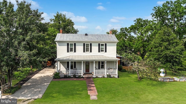 12353 Barbee Rd, Bristow, VA 20136 - view of front of house with a porch, a metal roof, a chimney, and a front lawn