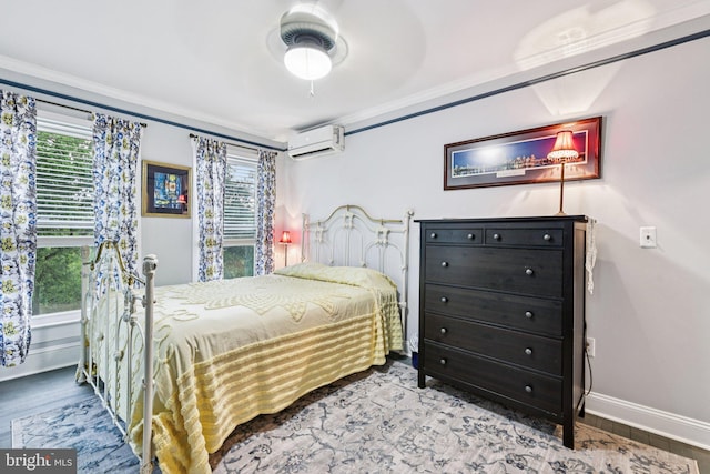12353 Barbee Rd, Bristow, VA 20136 - bedroom with a wall unit AC, wood finished floors, and ornamental molding