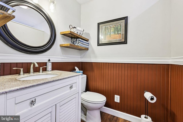12353 Barbee Rd, Bristow, VA 20136 - bathroom featuring wainscoting, vanity, and wood finished floors