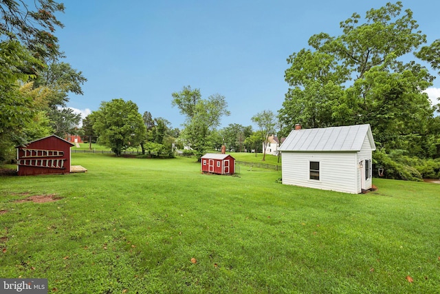 12353 Barbee Rd, Bristow, VA 20136 - view of grassy yard with a shed and view of scattered trees