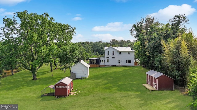 12353 Barbee Rd, Bristow, VA 20136 - view of green lawn with a storage shed