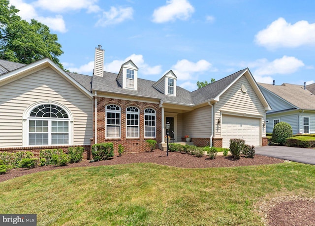 10112 Collington Campus Dr Unit 7, Bowie, MD 20721 - view of front of home featuring brick siding, asphalt driveway, an attached garage, a chimney, and a front lawn