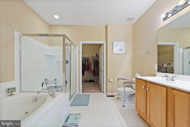 10112 Collington Campus Dr Unit 7, Bowie, MD 20721 - full bath featuring a spacious closet, vanity, a shower stall, a bath, and tile patterned flooring