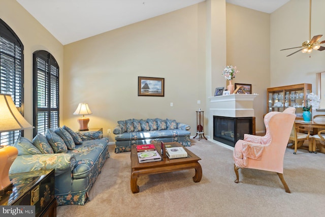 10112 Collington Campus Dr Unit 7, Bowie, MD 20721 - carpeted living area featuring high vaulted ceiling, a ceiling fan, and a glass covered fireplace